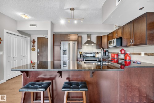 #115 35 Sturgeon Rd, St. Albert, AB - Indoor Photo Showing Kitchen With Stainless Steel Kitchen With Double Sink