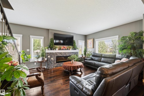 1457 Wates Link Sw, Edmonton, AB - Indoor Photo Showing Living Room With Fireplace