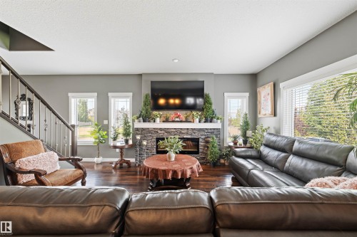 1457 Wates Link Sw, Edmonton, AB - Indoor Photo Showing Living Room With Fireplace