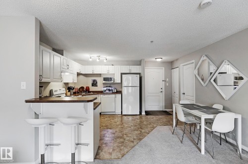 #203 111 Edwards Dr Sw, Edmonton, AB - Indoor Photo Showing Kitchen