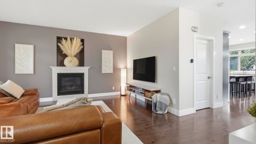 9847 92 Avenue Nw, Edmonton, AB - Indoor Photo Showing Living Room With Fireplace