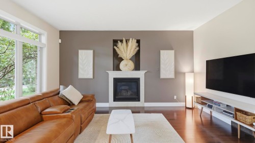 9847 92 Avenue Nw, Edmonton, AB - Indoor Photo Showing Living Room With Fireplace