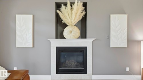 9847 92 Avenue Nw, Edmonton, AB - Indoor Photo Showing Living Room With Fireplace