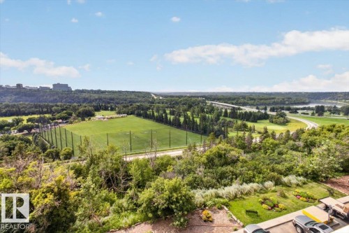 Expansive landscape with a golf course, driving range, and abundant mature trees - #506 12121 Jasper Av Nw, Edmonton, AB - Outdoor With View