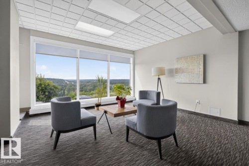 Full-height windows provide abundant natural light - #506 12121 Jasper Av Nw, Edmonton, AB - Indoor