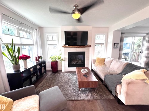 7004 97 Street Nw, Edmonton, AB - Indoor Photo Showing Living Room With Fireplace