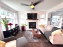 7004 97 Street Nw, Edmonton, AB  - Indoor Photo Showing Living Room With Fireplace 