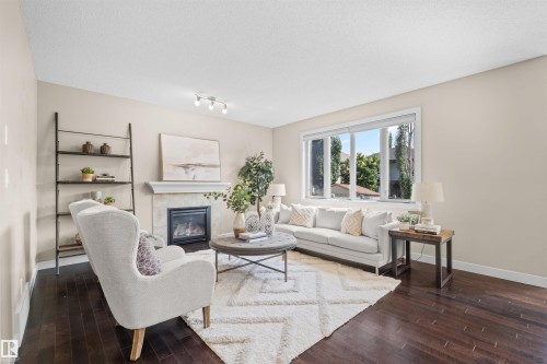 843 Armitage Wynd Sw, Edmonton, AB - Indoor Photo Showing Living Room With Fireplace