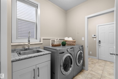 Main Floor - 843 Armitage Wynd Sw, Edmonton, AB - Indoor Photo Showing Laundry Room