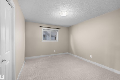 Bedroom 2 - 843 Armitage Wynd Sw, Edmonton, AB - Indoor Photo Showing Other Room