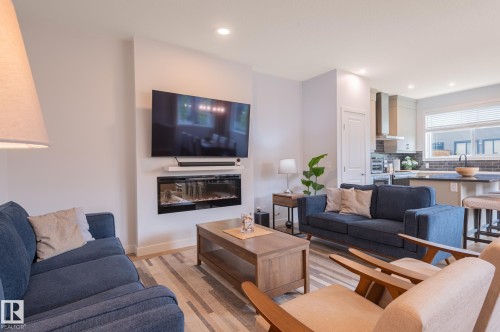 4804 Cawsey Terrace Sw, Edmonton, AB - Indoor Photo Showing Living Room With Fireplace