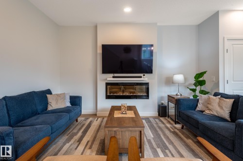 4804 Cawsey Terrace Sw, Edmonton, AB - Indoor Photo Showing Living Room With Fireplace