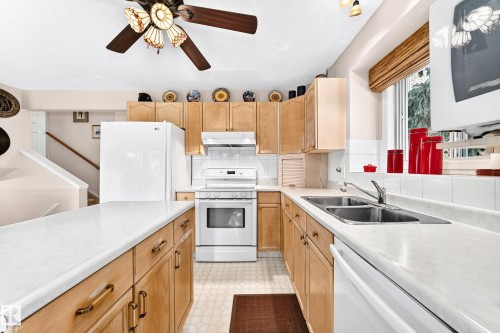 Open Kitchen offering Generous Storage & Counters - 350 Pearson Crescent Nw, Edmonton, AB - Indoor Photo Showing Kitchen With Double Sink