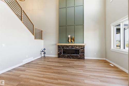 28 Harley Way, Spruce Grove, AB - Indoor Photo Showing Other Room With Fireplace