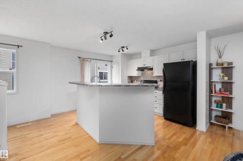 #83 8304 11 Av Sw, Edmonton, AB - Indoor Photo Showing Kitchen