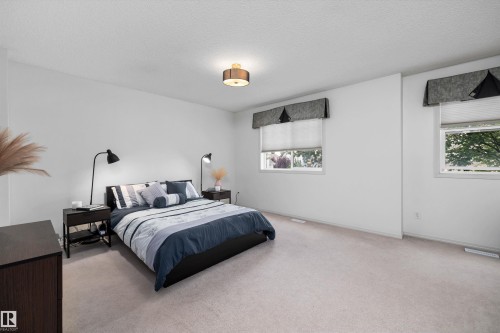 #83 8304 11 Av Sw, Edmonton, AB - Indoor Photo Showing Bedroom