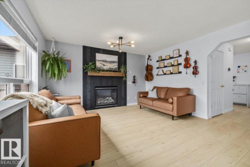 19040 47 Avenue Nw, Edmonton, AB - Indoor Photo Showing Living Room With Fireplace