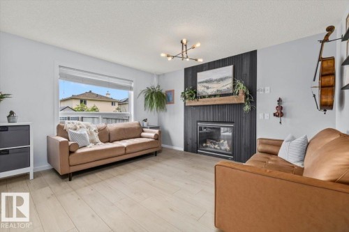 19040 47 Avenue Nw, Edmonton, AB - Indoor Photo Showing Other Room With Fireplace