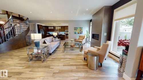 4810 Donsdale Drive Nw, Edmonton, AB - Indoor Photo Showing Living Room With Fireplace