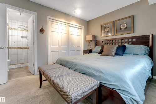 Warm neutral wall tones with carpet flooring - 6008 37 Avenue Nw, Edmonton, AB - Indoor Photo Showing Bedroom