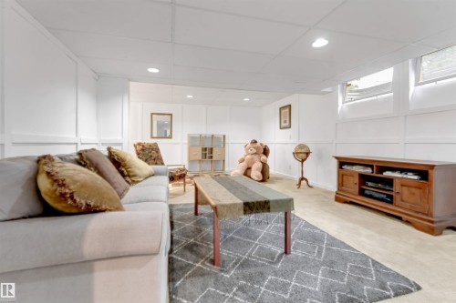 Recessed lighting, light-colored carpeting, and paneling accents - 6008 37 Avenue Nw, Edmonton, AB - Indoor