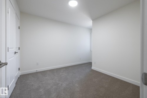#24 7020 Keswick Cm Sw, Edmonton, AB - Indoor Photo Showing Other Room