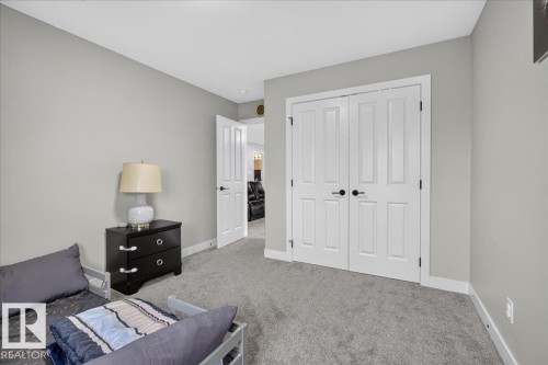 Wall-to-wall carpeting and neutral wall paint - 6813 Knox Loop Sw, Edmonton, AB - Indoor Photo Showing Bedroom
