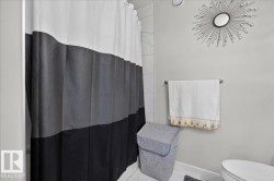 White wall tile shower surround, chrome towel bar - 