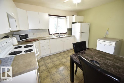 5007 2 Street, Boyle, AB - Indoor Photo Showing Kitchen With Double Sink