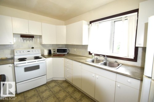 5007 2 Street, Boyle, AB - Indoor Photo Showing Kitchen With Double Sink