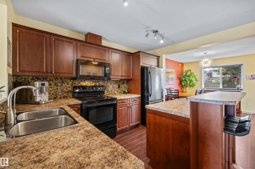 #20 3751 12 St Nw, Edmonton, AB - Indoor Photo Showing Kitchen With Double Sink