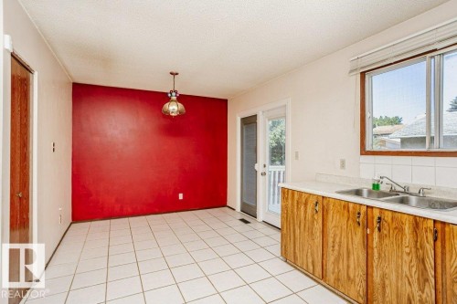 3520 42 Avenue Nw, Edmonton, AB - Indoor Photo Showing Kitchen With Double Sink