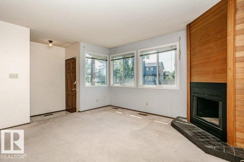 3520 42 Avenue Nw, Edmonton, AB - Indoor With Fireplace