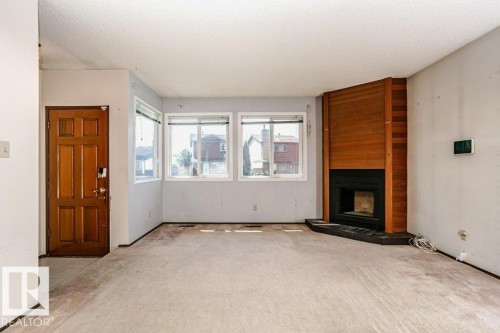 3520 42 Avenue Nw, Edmonton, AB - Indoor With Fireplace