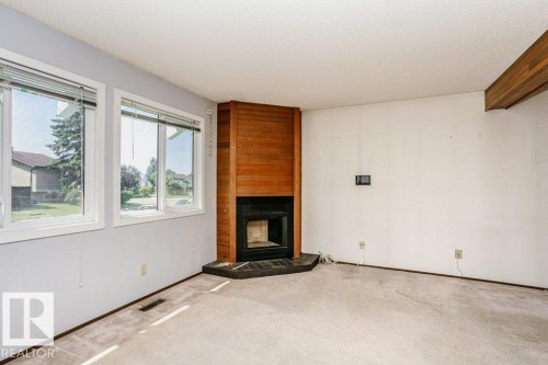 3520 42 Avenue Nw, Edmonton, AB - Indoor With Fireplace