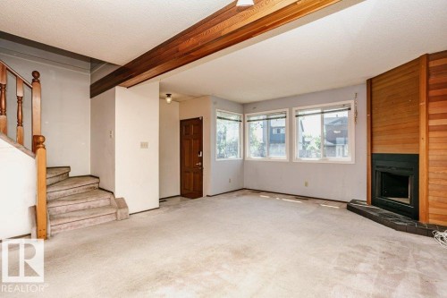 3520 42 Avenue Nw, Edmonton, AB - Indoor Photo Showing Other Room With Fireplace