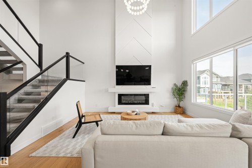 3415 Chickadee Drive Nw, Edmonton, AB - Indoor Photo Showing Living Room With Fireplace