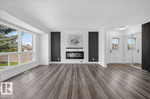 18903 86A Avenue Nw, Edmonton, AB - Indoor Photo Showing Living Room With Fireplace