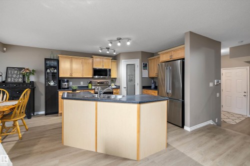 133 Greystone Crescent, Spruce Grove, AB - Indoor Photo Showing Kitchen With Double Sink