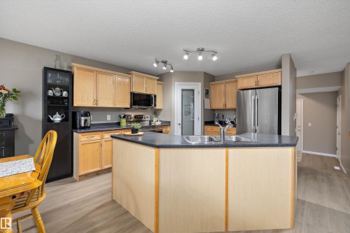 133 Greystone Crescent, Spruce Grove, AB - Indoor Photo Showing Kitchen With Double Sink
