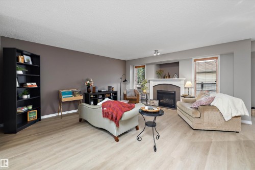 133 Greystone Crescent, Spruce Grove, AB - Indoor Photo Showing Living Room With Fireplace