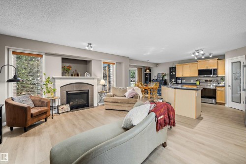 133 Greystone Crescent, Spruce Grove, AB - Indoor Photo Showing Living Room With Fireplace