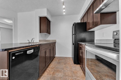 #323 274 Mcconachie Dr Nw, Edmonton, AB - Indoor Photo Showing Kitchen