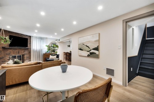 7211 132 Avenue Nw, Edmonton, AB - Indoor Photo Showing Dining Room With Fireplace