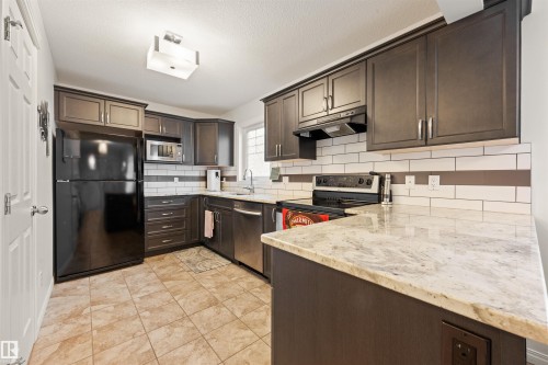 12425 111 Avenue Nw, Edmonton, AB - Indoor Photo Showing Kitchen With Upgraded Kitchen