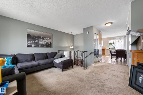 14531 31A Street Nw, Edmonton, AB - Indoor Photo Showing Living Room With Fireplace