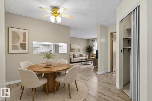 Wood-finish flooring throughout - #102 6710 158 Av Nw, Edmonton, AB 
