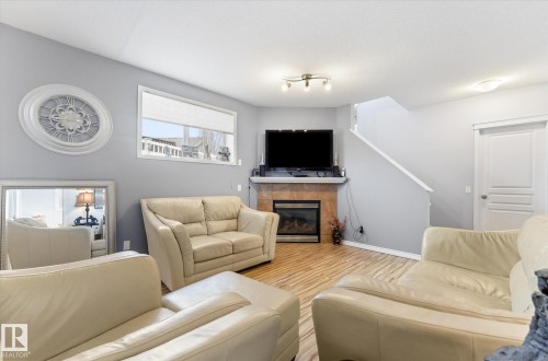 16303 37 Street Nw, Edmonton, AB - Indoor Photo Showing Living Room With Fireplace