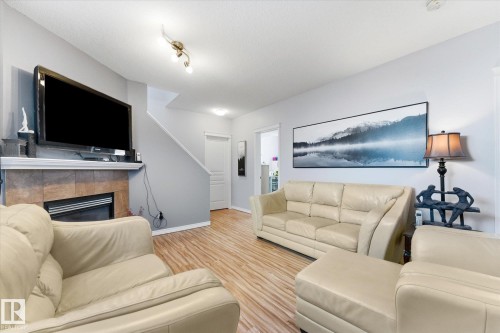 16303 37 Street Nw, Edmonton, AB - Indoor Photo Showing Living Room With Fireplace
