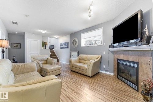 16303 37 Street Nw, Edmonton, AB - Indoor Photo Showing Living Room With Fireplace